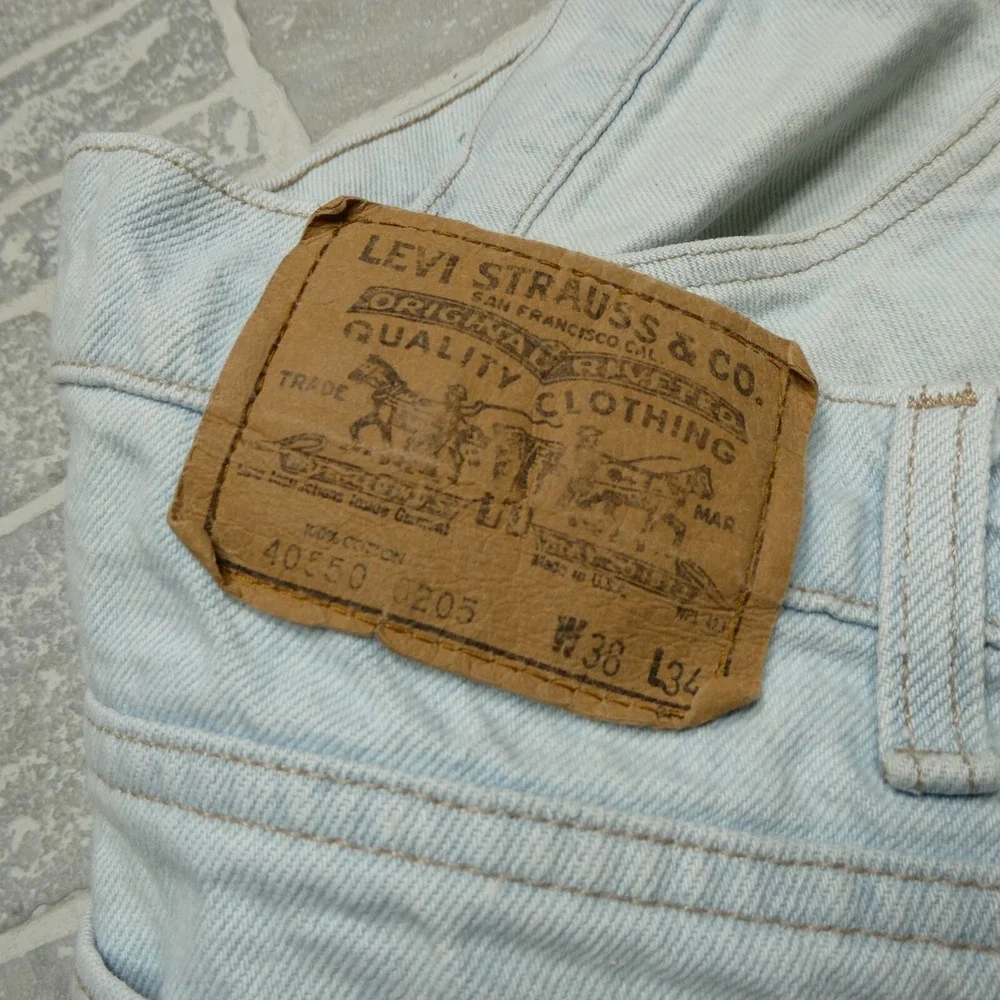 VINTAGE Levis Jeans Size 37x33 Light Wash Slight Taper USA Made Orange Tab